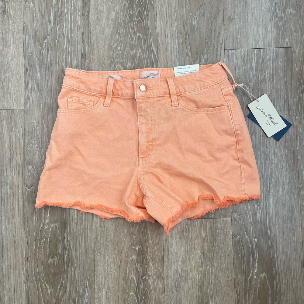 Orange denim shorts